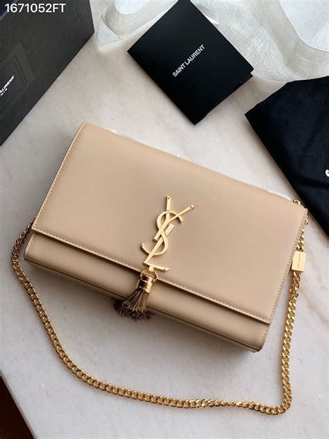 ysl beige bags|YSL beige bag with tassel.